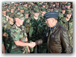 General shaking hands of soldiers